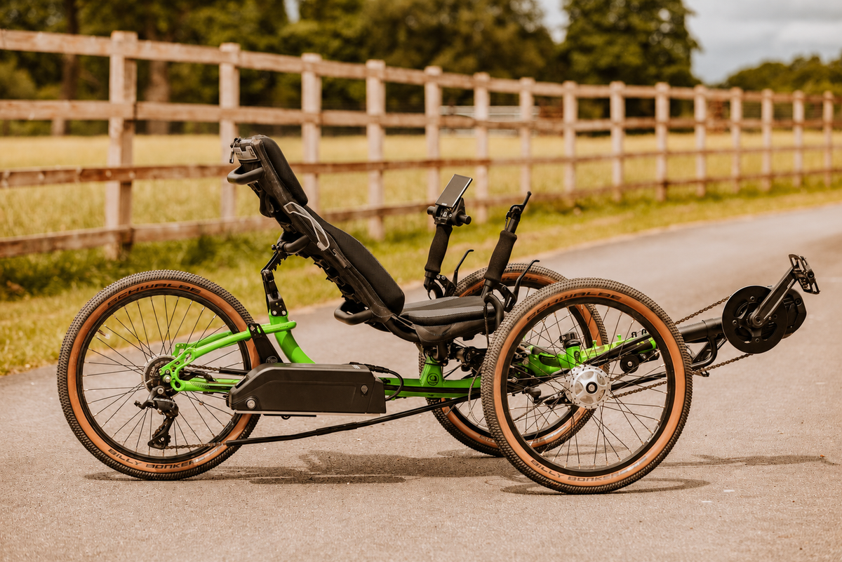 Green recumbent trike fitted with a complete Gride GXT+ system